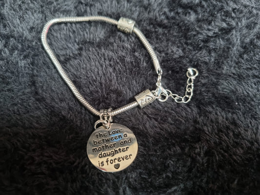 The love between a mother and daughter... charm bracelet